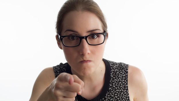 Angry woman pointing