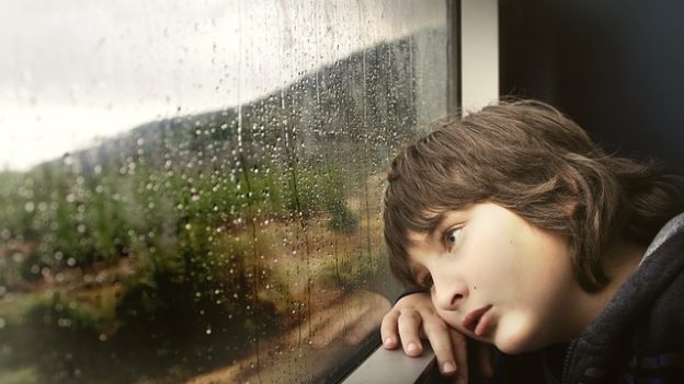 Child looking out the window