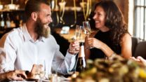 Photograph of two people drinking to illustrate article on HR policies