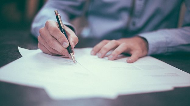 Photo of someone writing