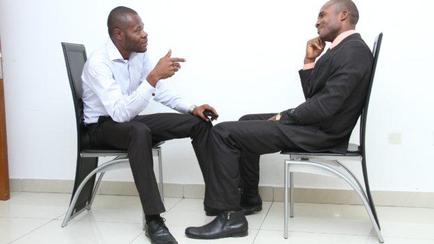 Two men chatting