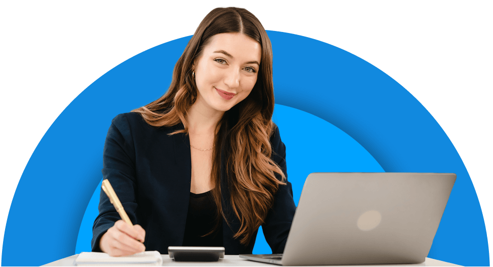 person on laptop payroll writing