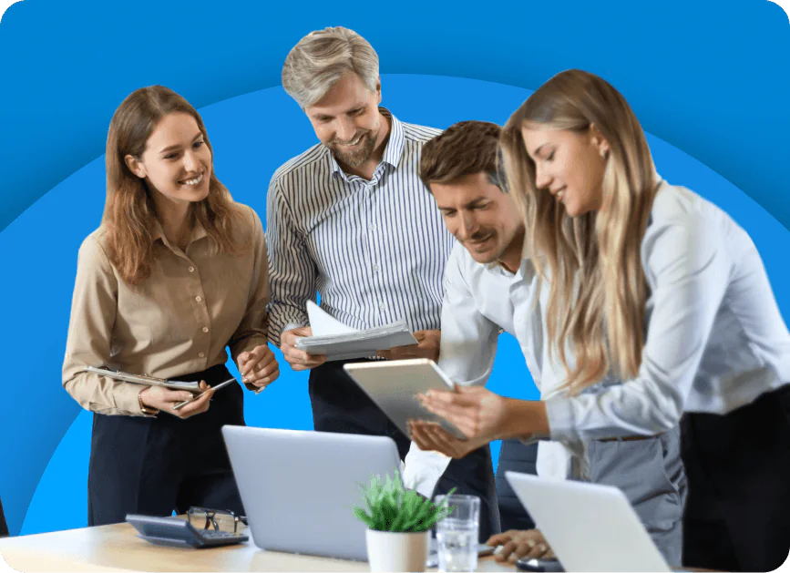 Image of HR personnel around a laptop computer